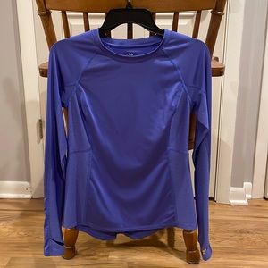 Fila Women’s sport dri-fit top.  Size small.  Excellent condition.